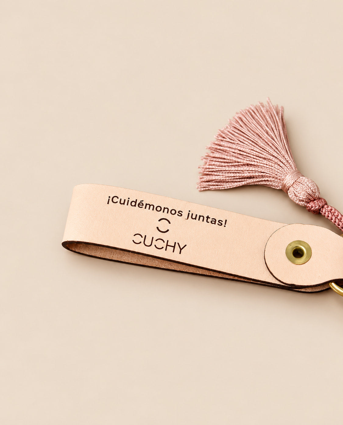 Chaveiro CUCHY de couro natural | Dia contra o câncer de mama