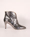 High-heeled ankle boots with embossed metallic leather | Glow Silver